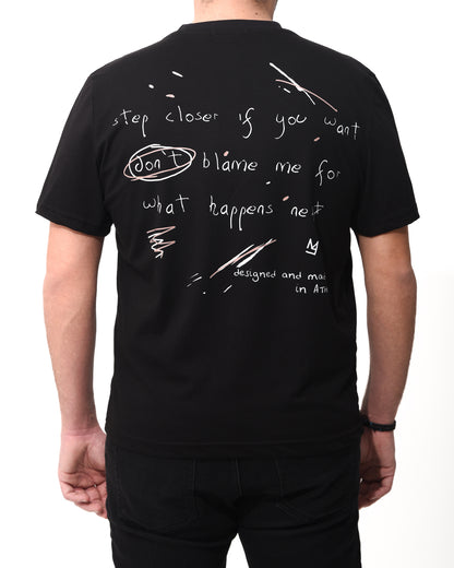 "Step Closer" Unisex Tee In Black